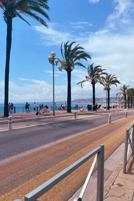 Promenade Des Anglais in Nice, France which is home to some of the best beach clubs in French Riviera