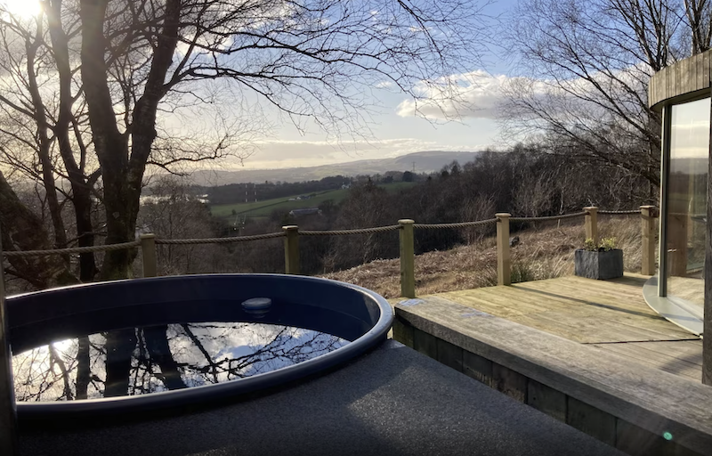 circular outdoor hot tub at a lodge in Glasgow