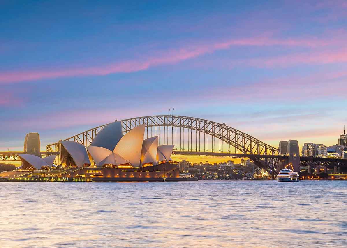 Sydney Opera House and Sydney Harbour Bridge at sunset