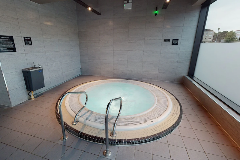 circular indoor Jacuzzi built into the ground at the Village Hotel Glasgow