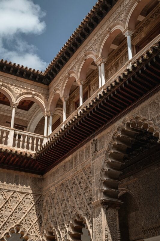 ornate courtyard at the Royal Alcázar of Seville 