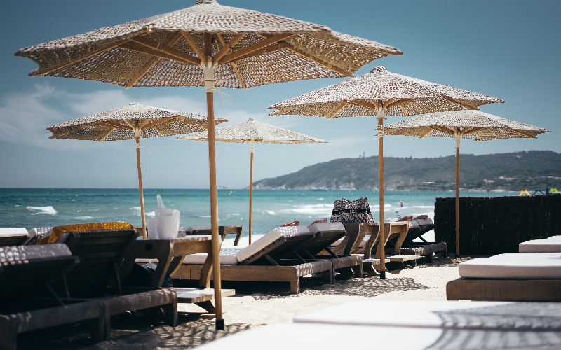 sunloungers at a beach club in the French Riviera