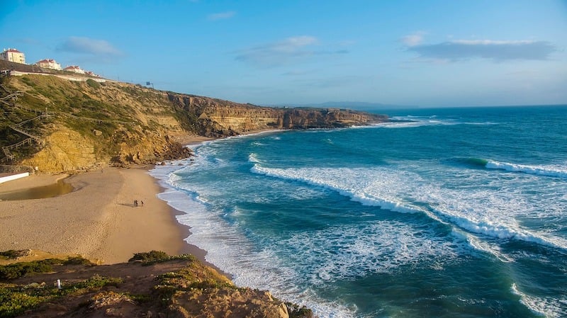 traveler visiting a beach in Ericeira while traveling solo in Lisbon
