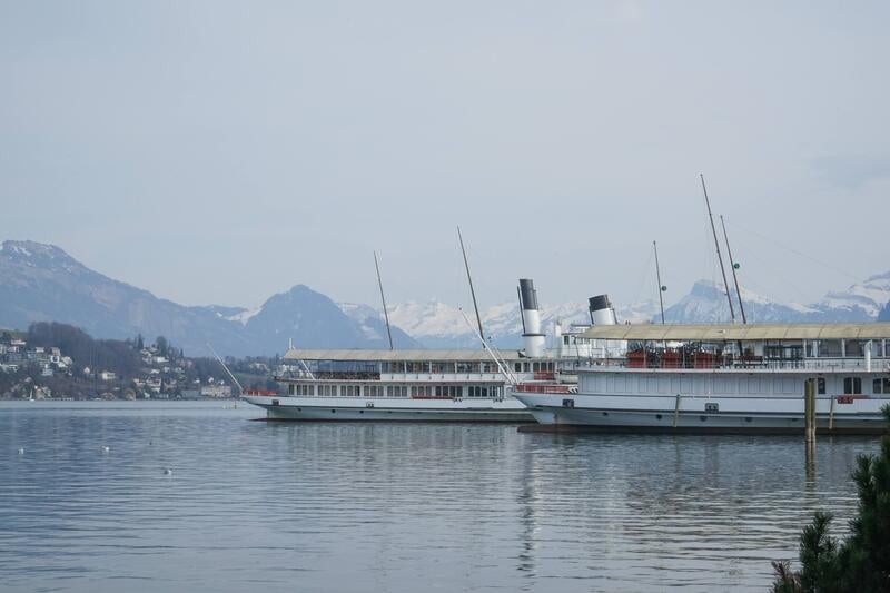 solo traveler in Switzerland cruising on Lake Lucerne