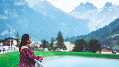 solo female traveler in Switzerland enjoying the view