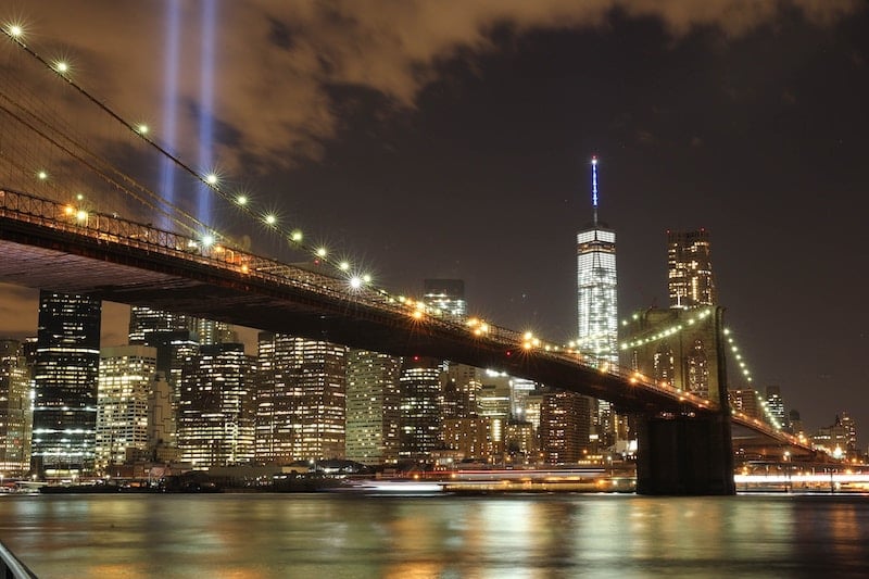 Brooklyn Bridge and Manhattan skyline lit up at night