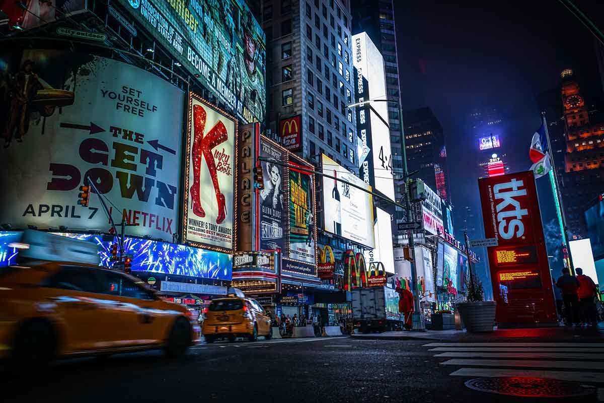 electronic billboards showcasing contemporary art during the Midnight Moment in Times Square New York City