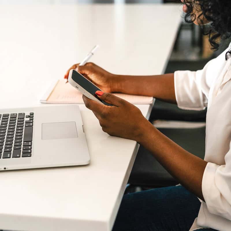 woman using an AI tool to create blog content