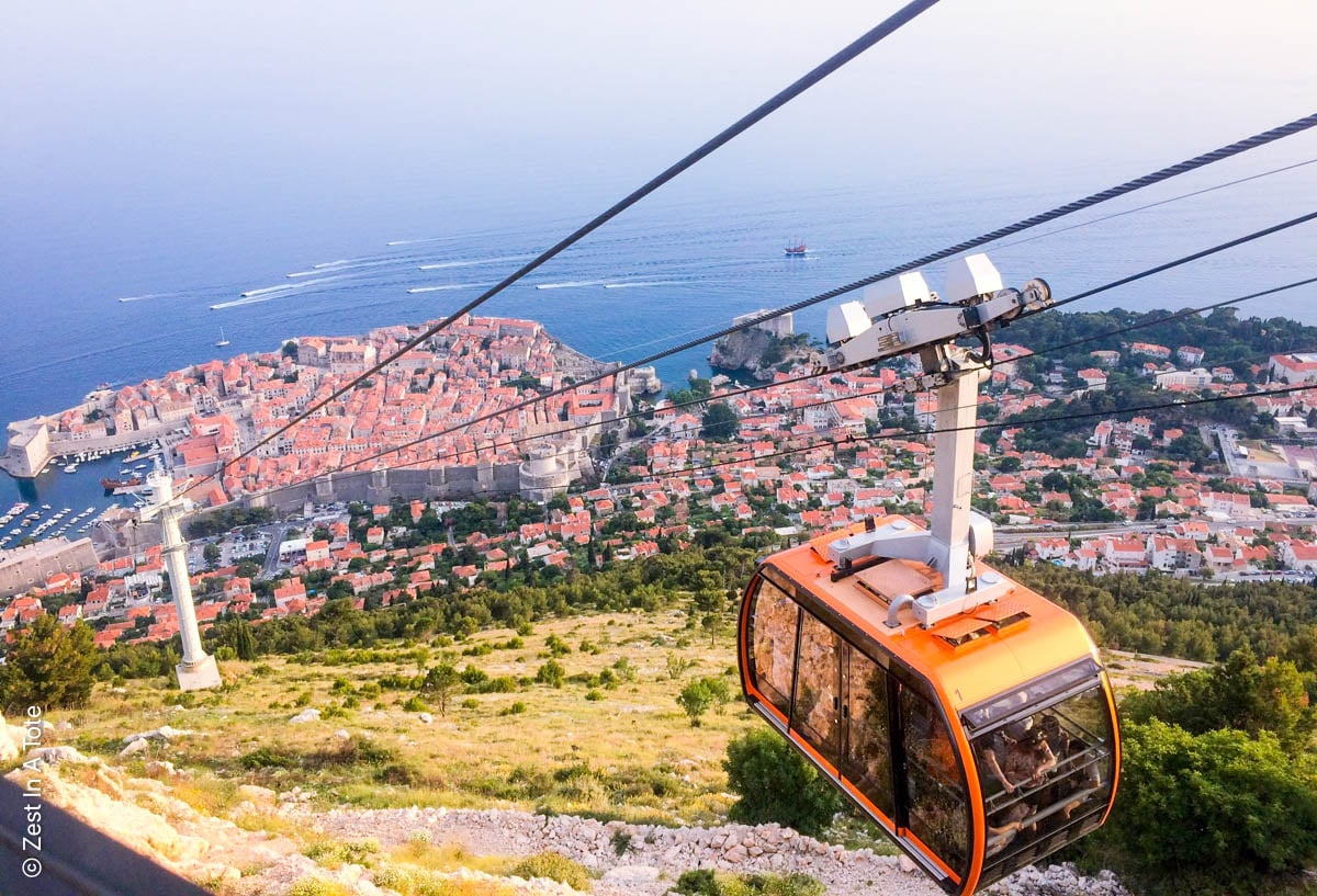 a cable car climbing up the hillside for a panoramic view over the Dalmatian Coast of Dubrovnik, Croatia