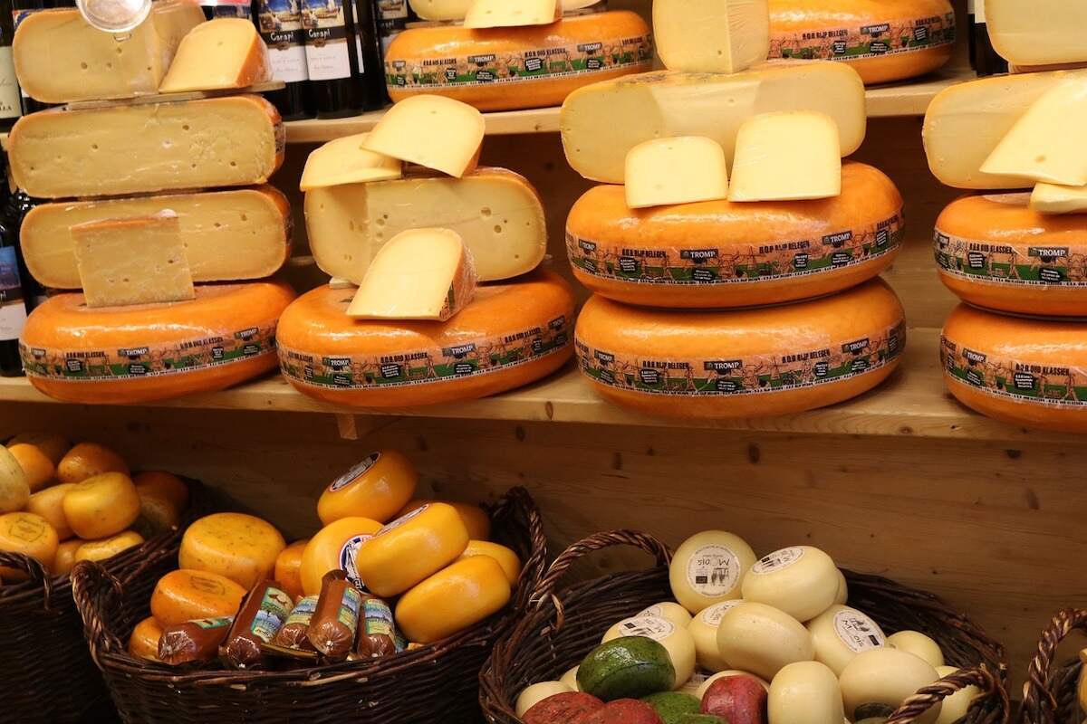 shelves full of Dutch cheeses that are free to sample in Amsterdam