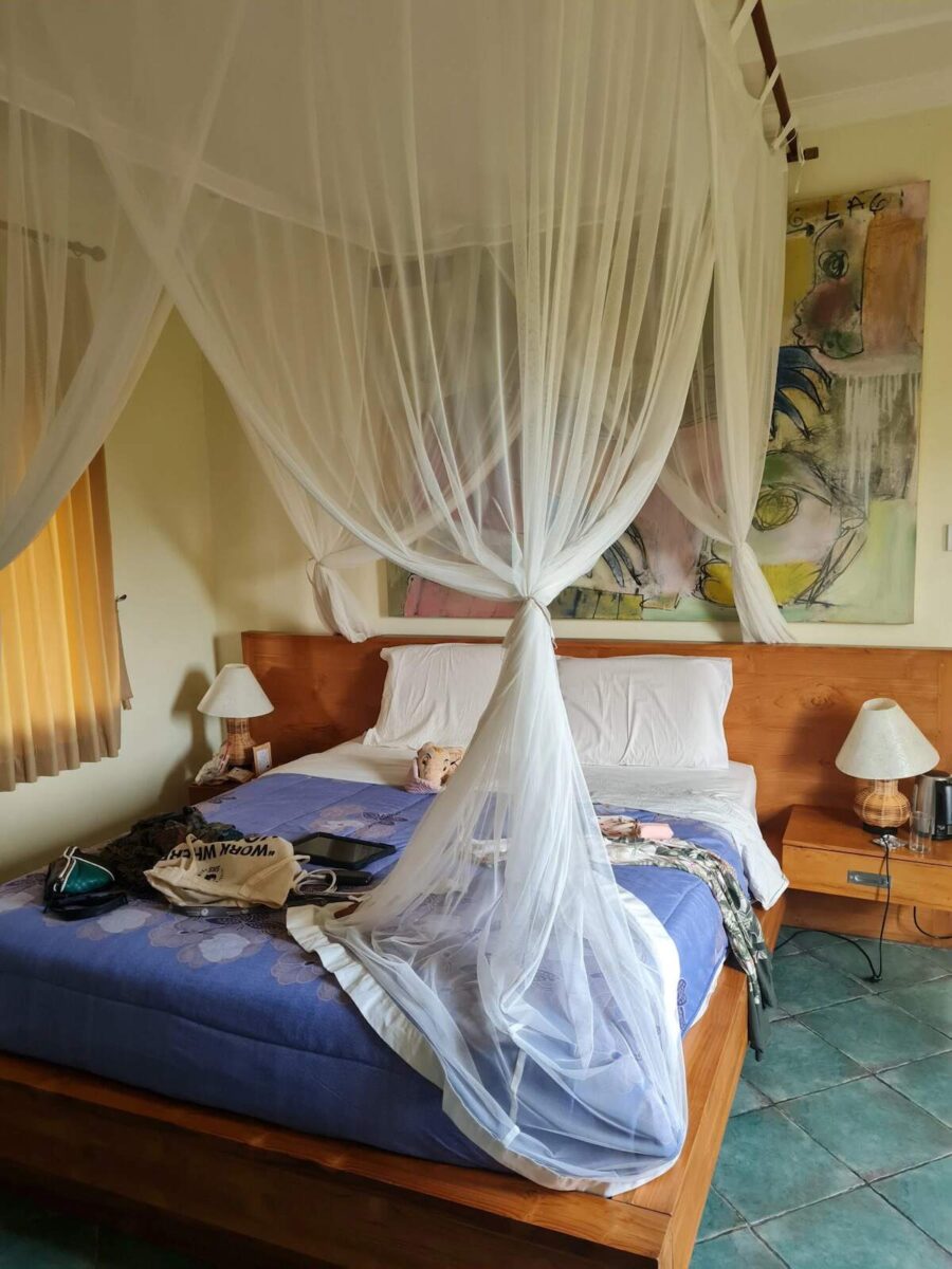 Cozy guestroom at Metteya Healing House homestay in Ubud, perfect for solo travelers looking for a tranquil stay in Bali with easy access to local attractions.