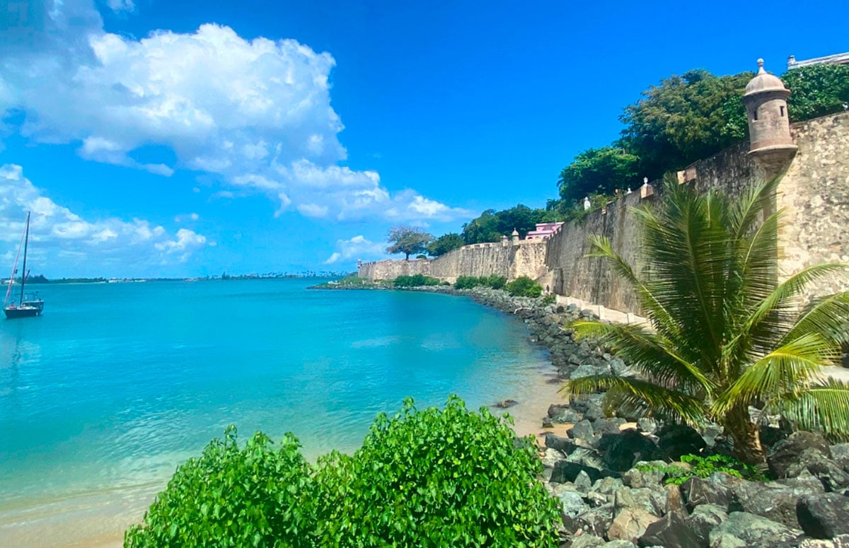 turquoise Caribbean waters lapping up against the coast of Puerto Rico and the Old San Juan Walls