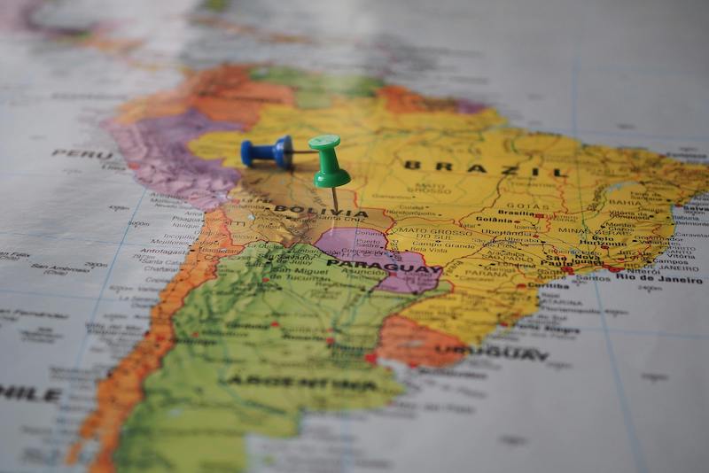 map of South America with a push pin in Bolivia