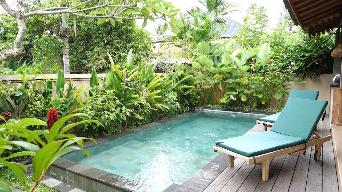 Relaxing pool area at Royal Casa Ganesha in Ubud, a perfect retreat for solo travelers staying in Bali hotels.
