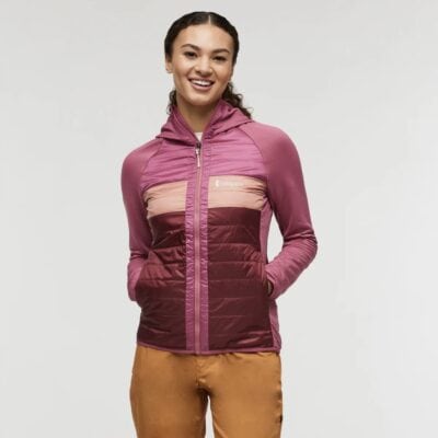 female hiker wearing a Cotopaxi jacket