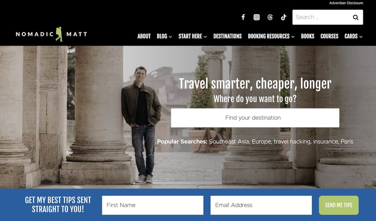 Screenshot of the Nomadic Matt website homepage, showing Matt leaning against a stone column in Rome beside the headline “Travel smarter, cheaper, longer,” a “Find your destination” search bar, and an email signup bar reading “Get my best tips sent straight to you!”