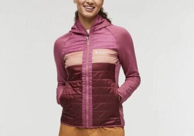 female hiker wearing a Cotopaxi jacket